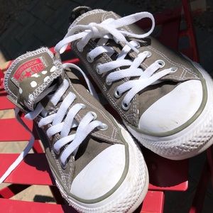 Low-top Converse Chuck Taylors with polka dots